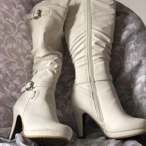 White knee high boots